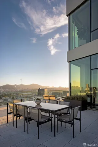 a view of a tables and chairs in the patio