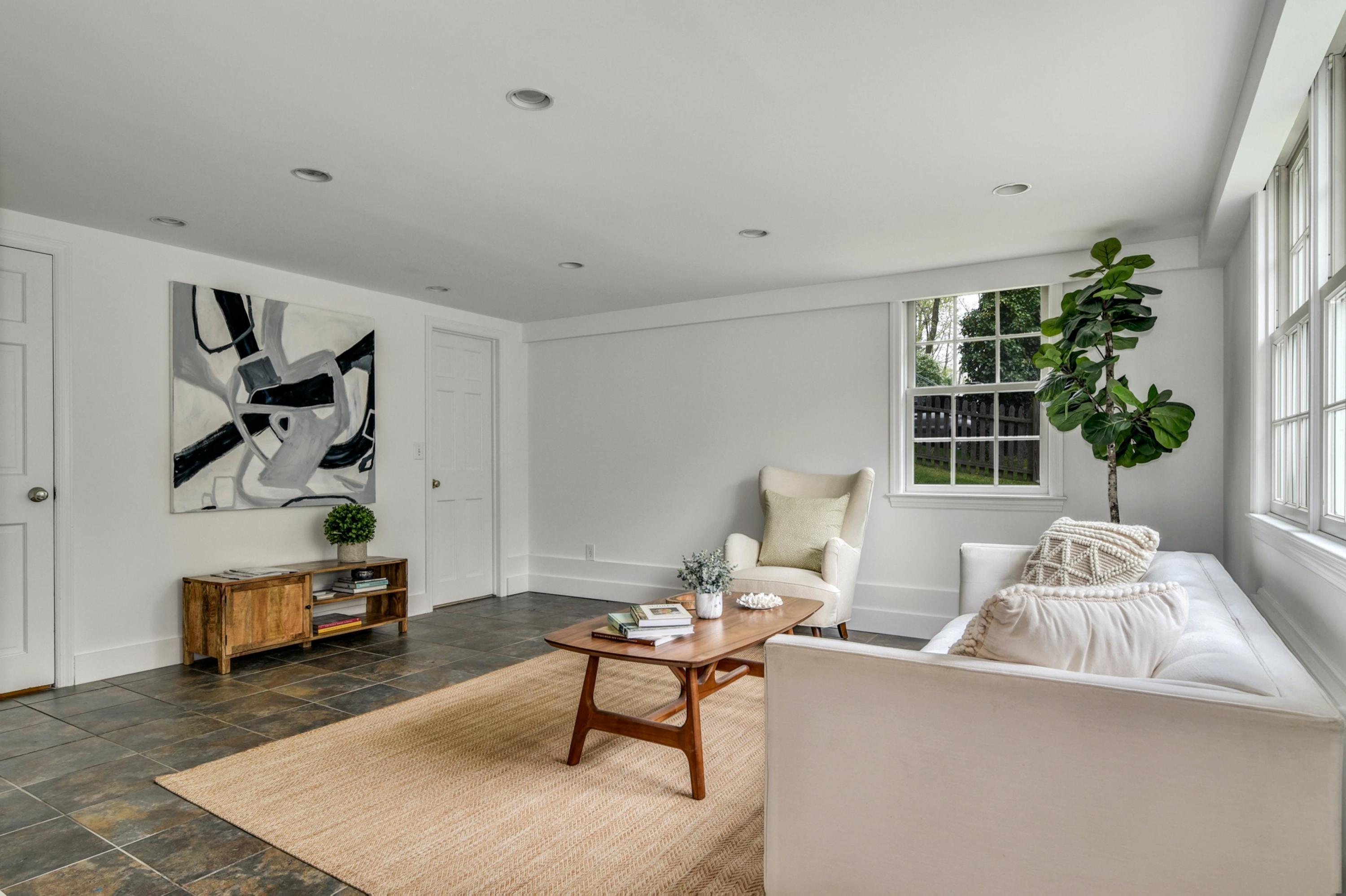 212 Tokeneke Road Darien, CT 06820 - Photo 17 of 23 a living room with furniture and wooden floor