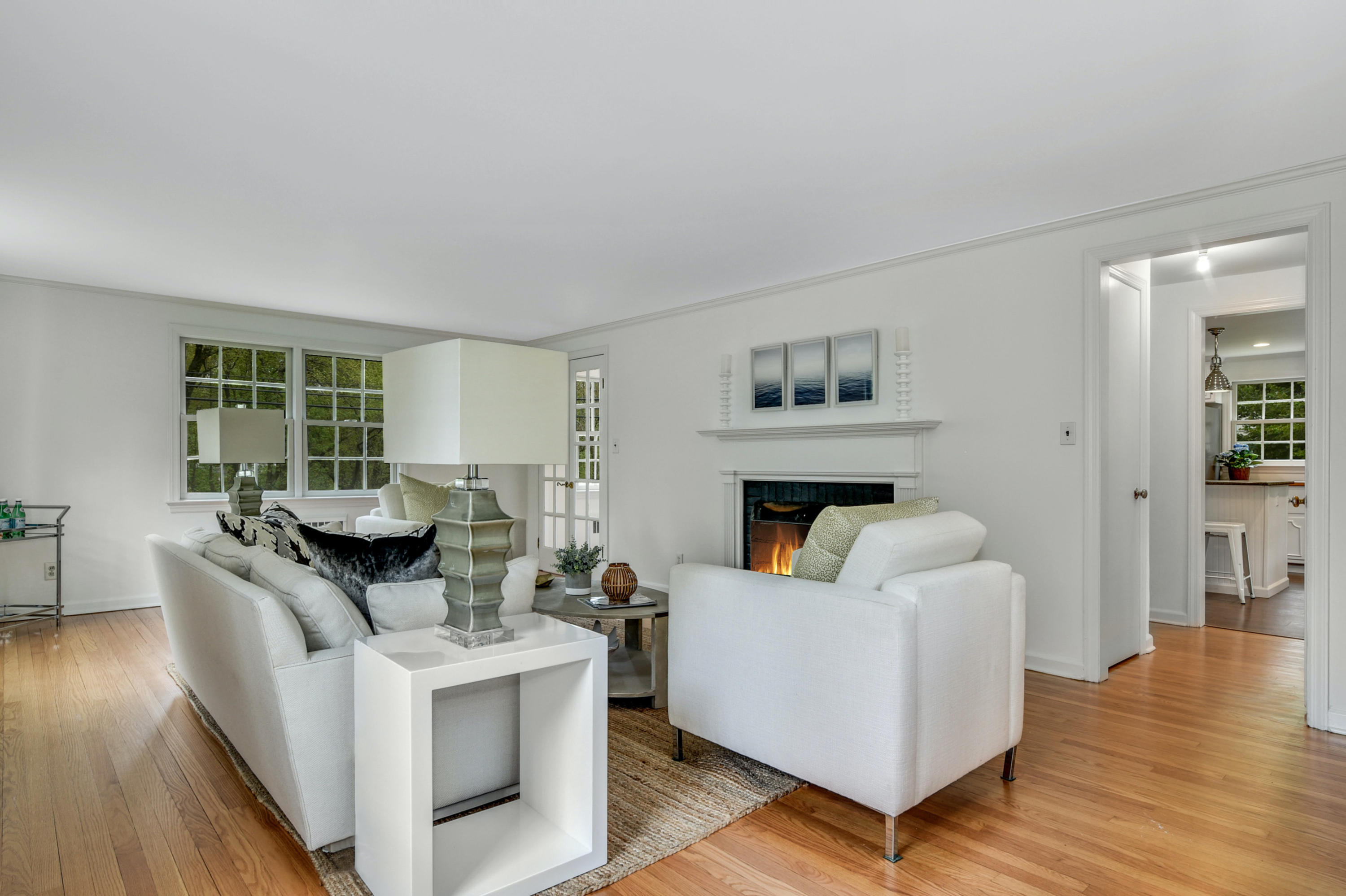 212 Tokeneke Road Darien, CT 06820 - Photo 4 of 23 a living room with furniture and a fireplace