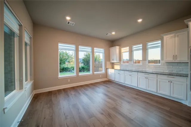 a view of a bathroom from the hallway
