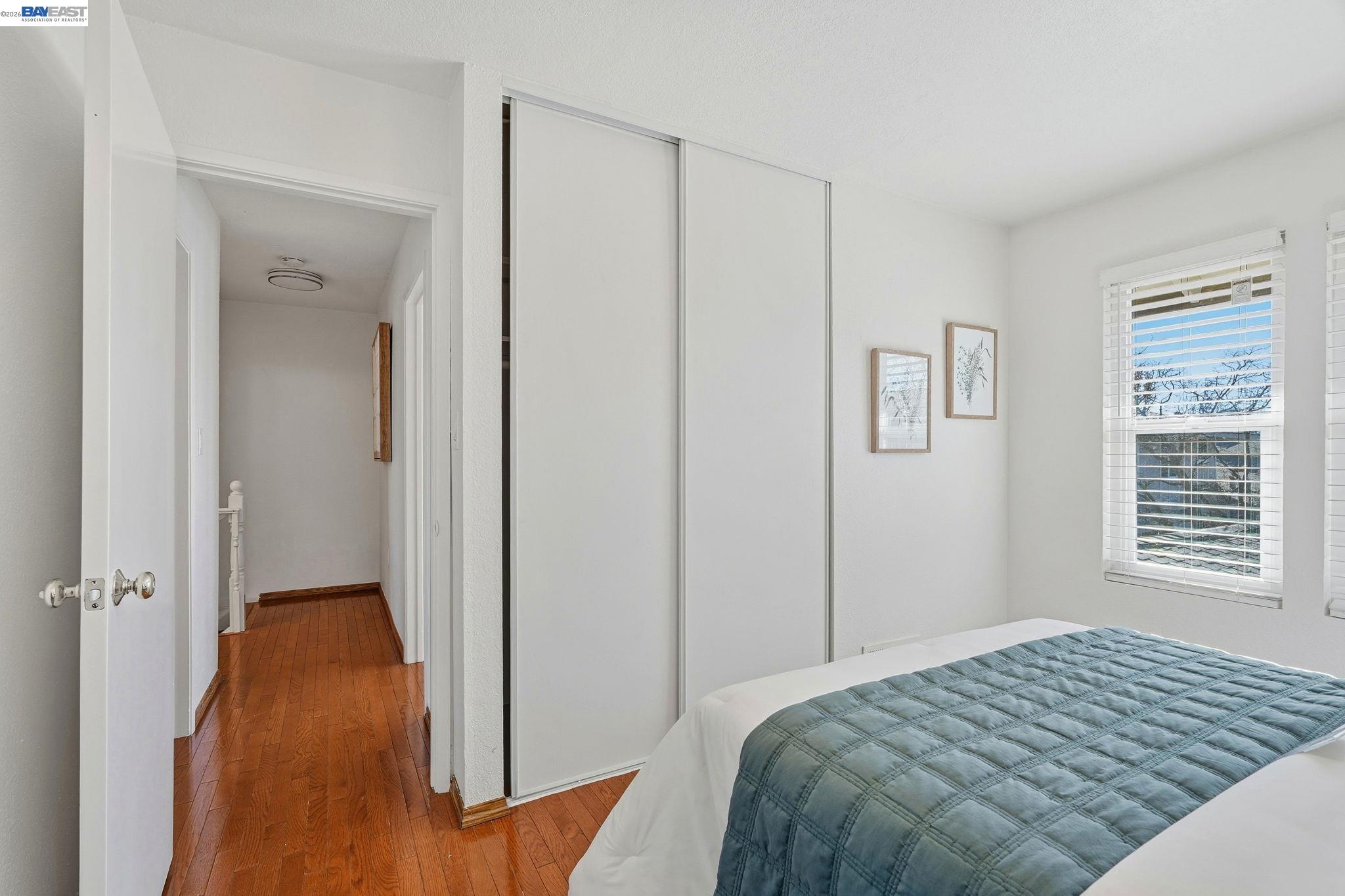 21091 Red Fir Court Cupertino, CA 95014 - Photo 17 of 39 a bedroom with a bed and a window