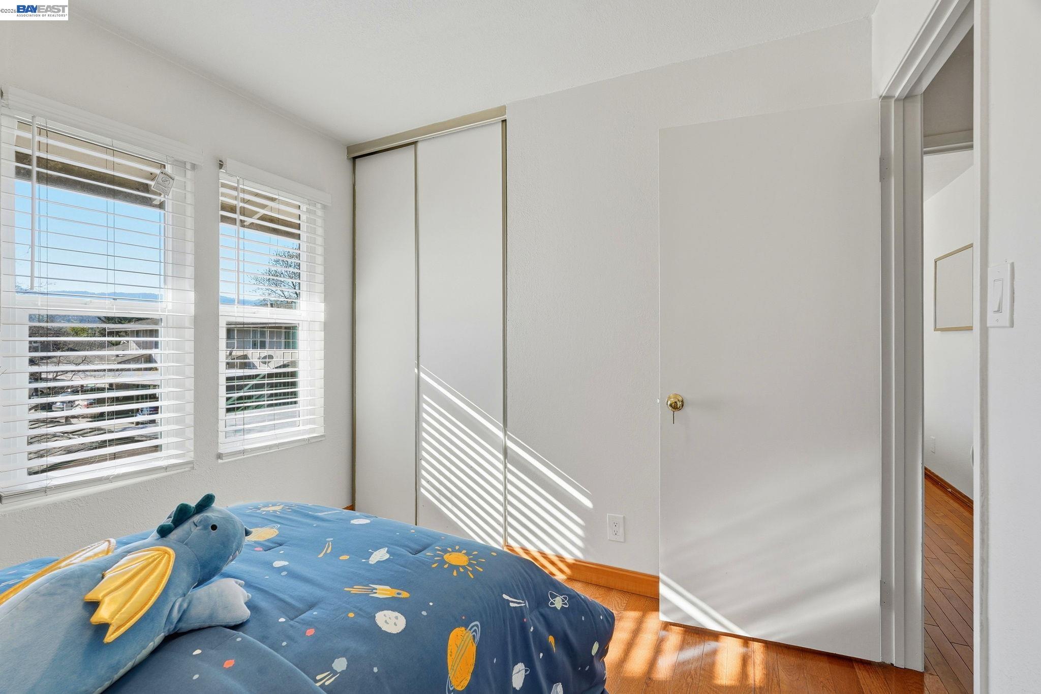 21091 Red Fir Court Cupertino, CA 95014 - Photo 19 of 39 a bedroom with a bed and a window