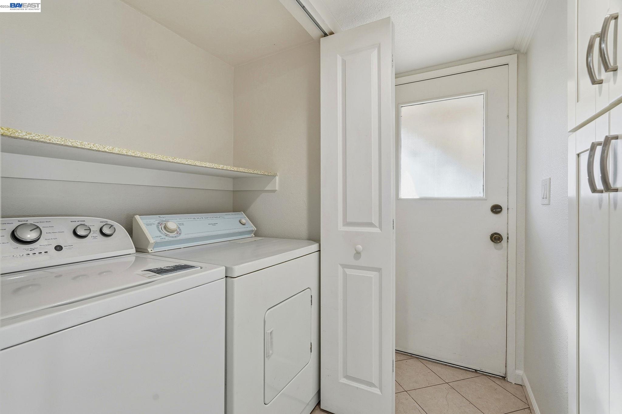 21091 Red Fir Court Cupertino, CA 95014 - Photo 24 of 39 a utility room with dryer and washer