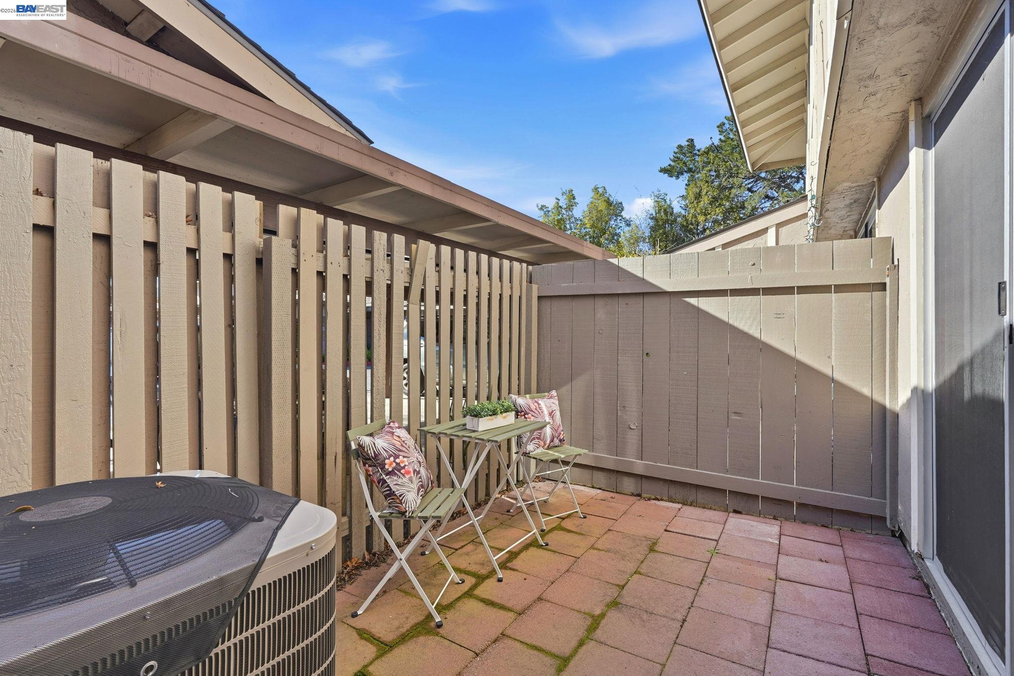 21091 Red Fir Court Cupertino, CA 95014 - Photo 28 of 39 a patio with table and chairs