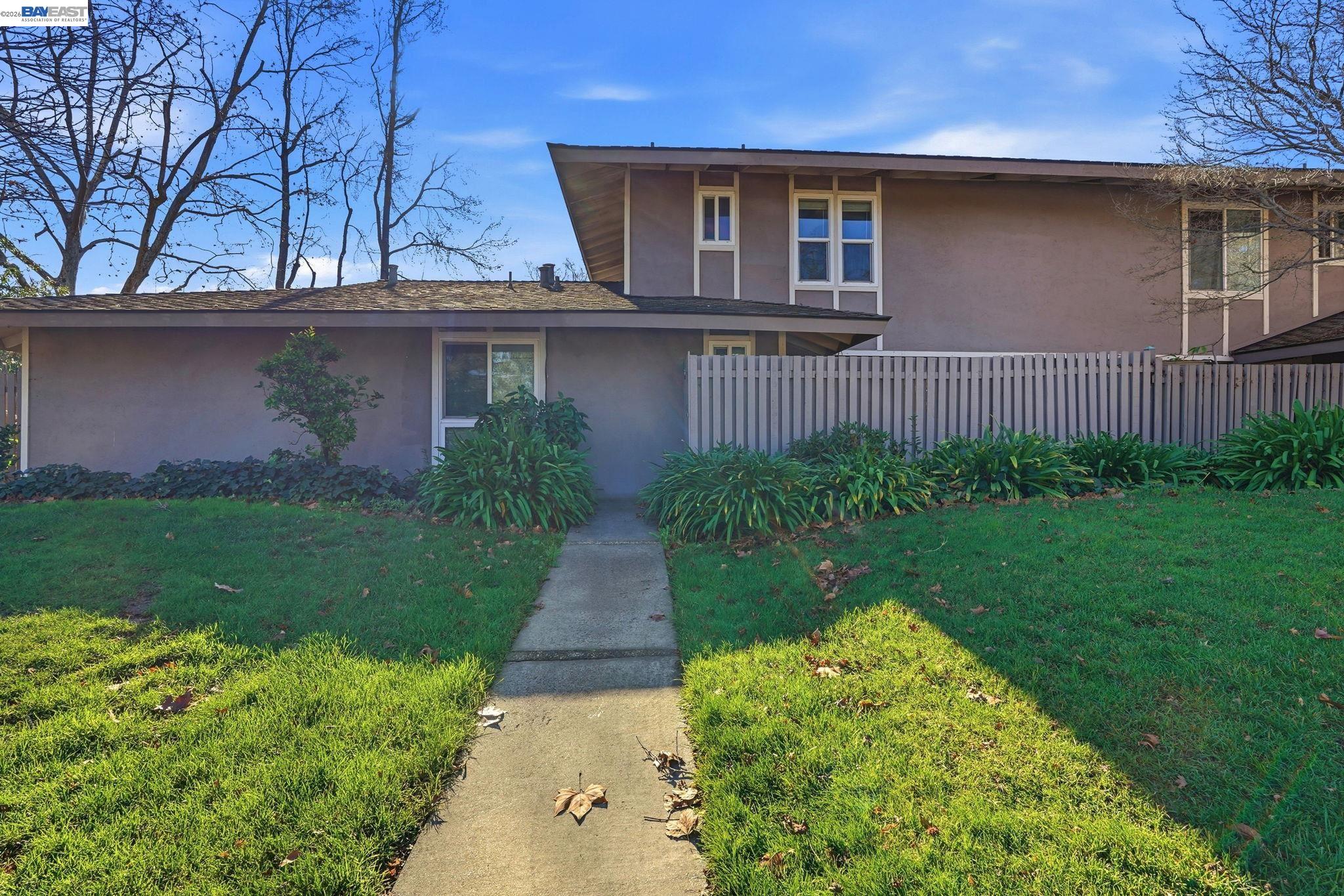 21091 Red Fir Court Cupertino, CA 95014 - Photo 31 of 39 a view of a house with a yard and plants