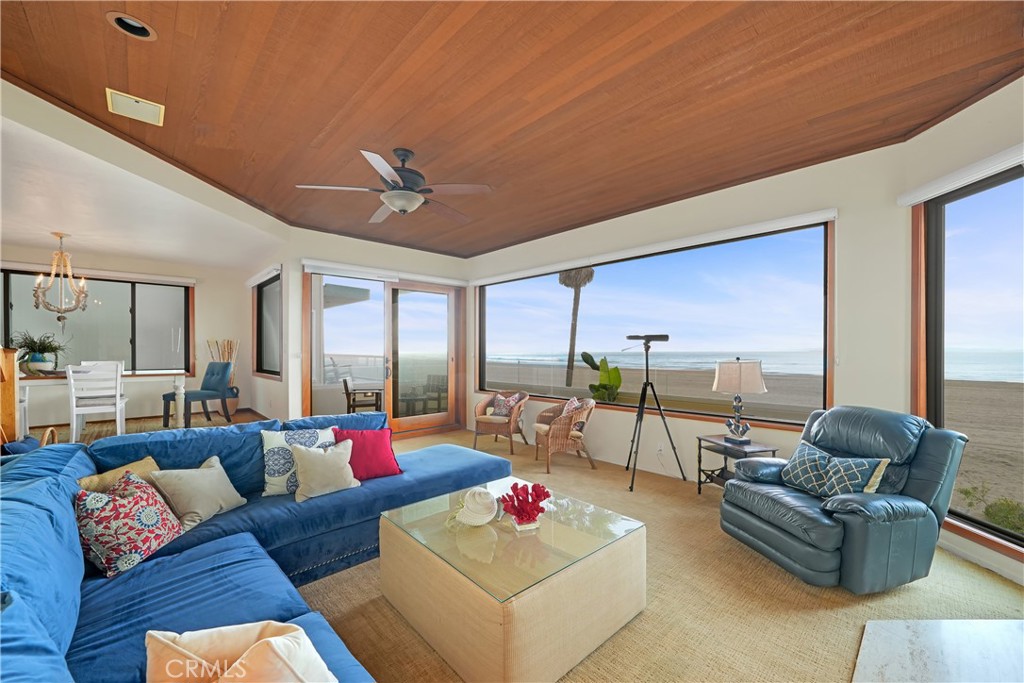 72-B Surfside Avenue Surfside, CA 90743 - Photo 25 of 56 a living room with furniture and a large window