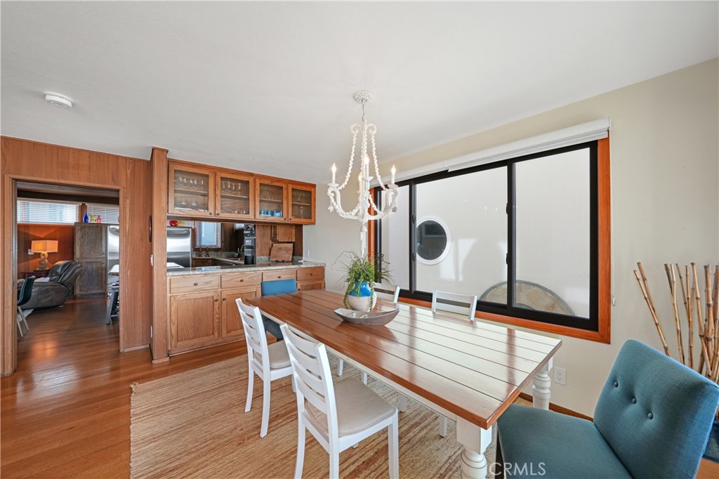 72-B Surfside Avenue Surfside, CA 90743 - Photo 26 of 56 a living room with furniture and a flat screen tv