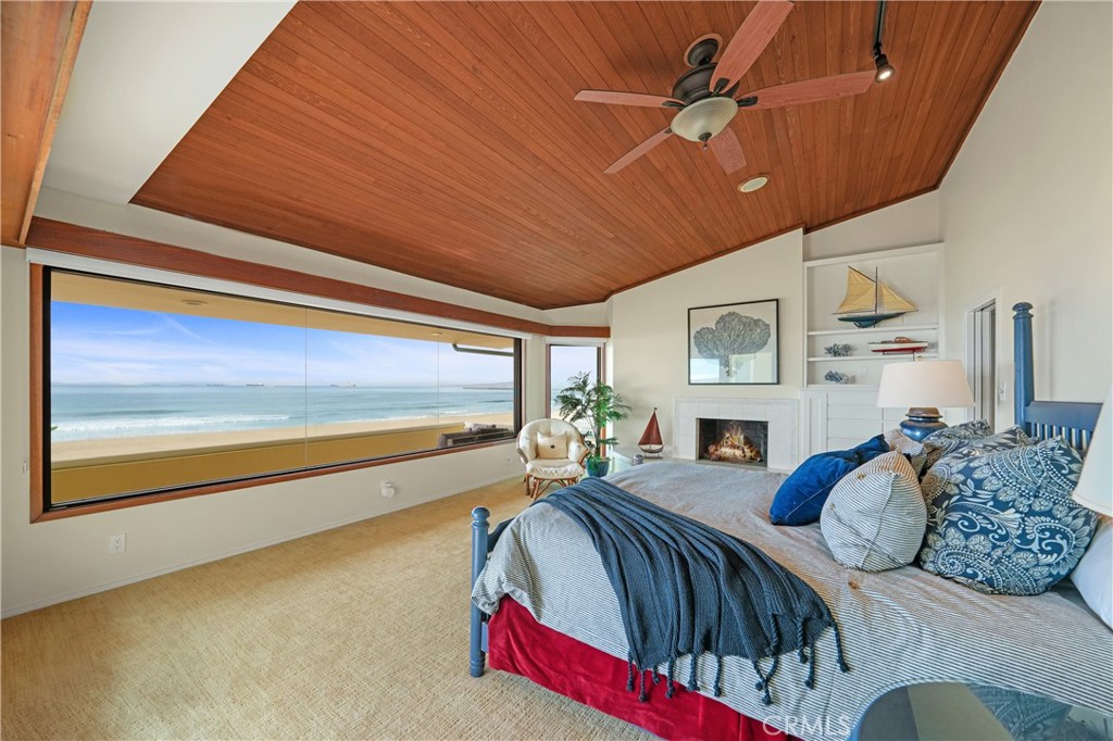72-B Surfside Avenue Surfside, CA 90743 - Photo 36 of 56 a bed room with a bed and a large window