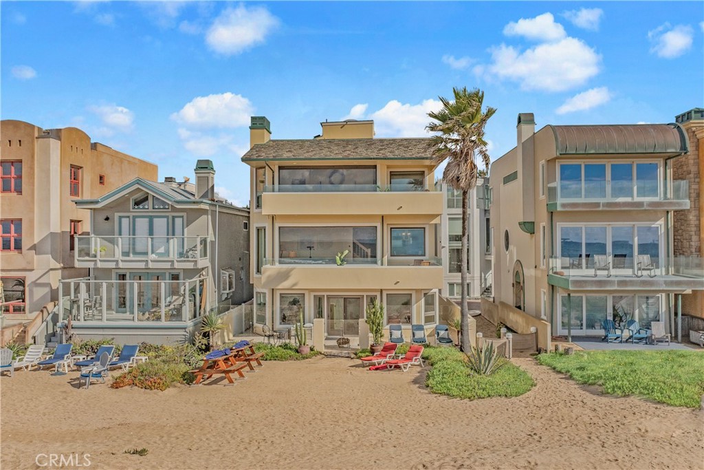 72-B Surfside Avenue Surfside, CA 90743 - Photo 4 of 56 a front view of a building with garden