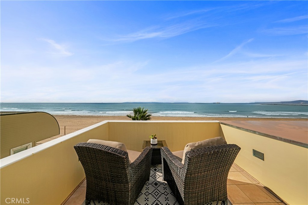 72-B Surfside Avenue Surfside, CA 90743 - Photo 49 of 56 a view of a swimming pool and an outdoor seating