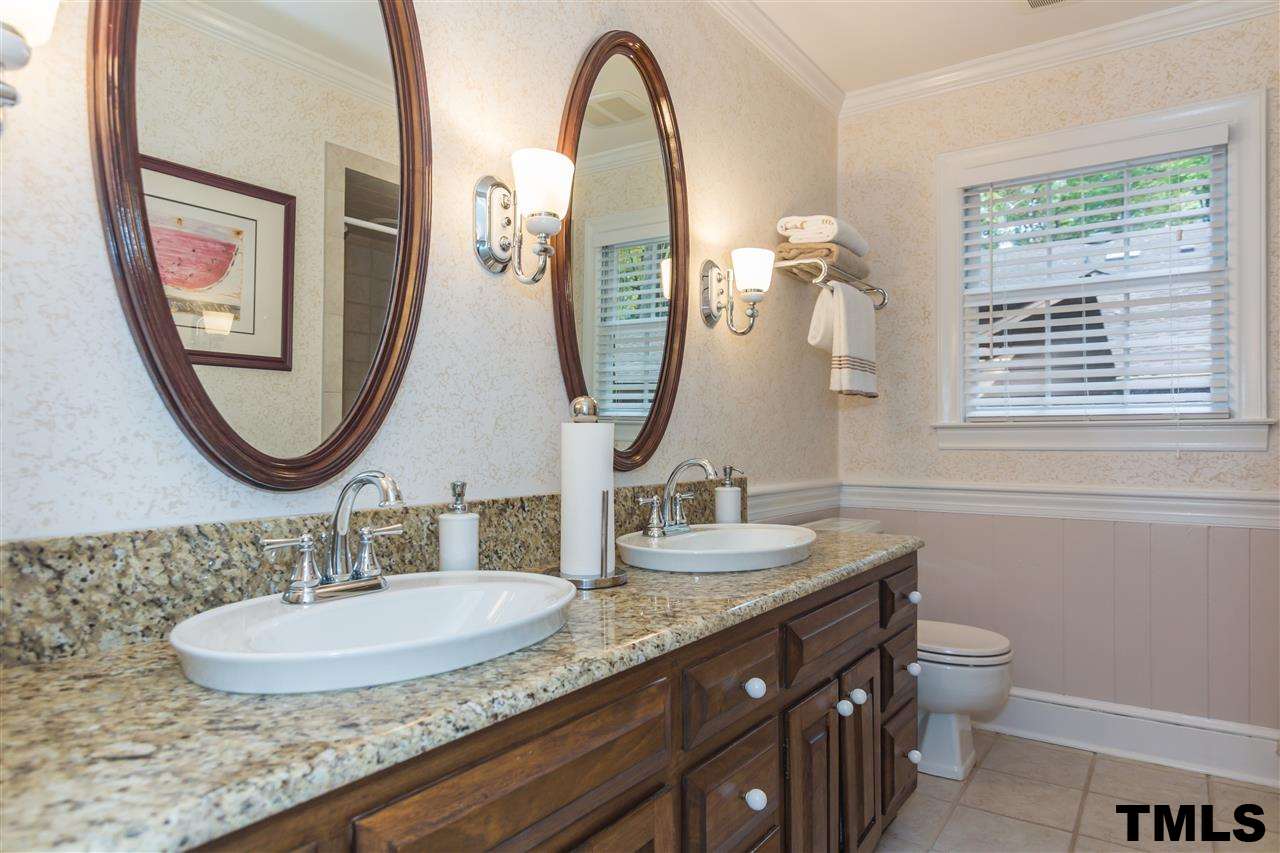 912 Queensferry Road Cary, NC 27511 - Photo 20 of 25 Lower level bathroom with dual vanity and granite countertops!