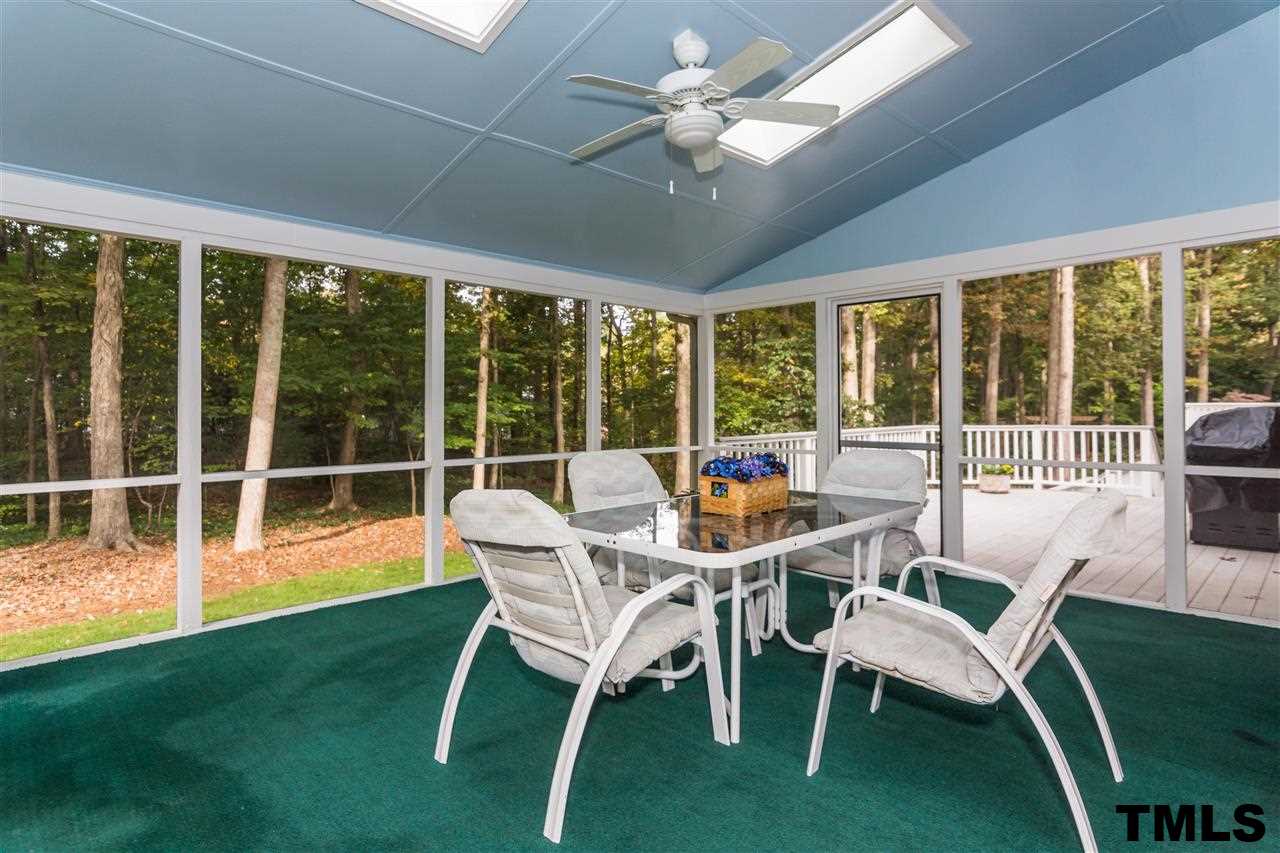912 Queensferry Road Cary, NC 27511 - Photo 23 of 25 Screened in Porch overlooks large, flat, fenced in back yard!
