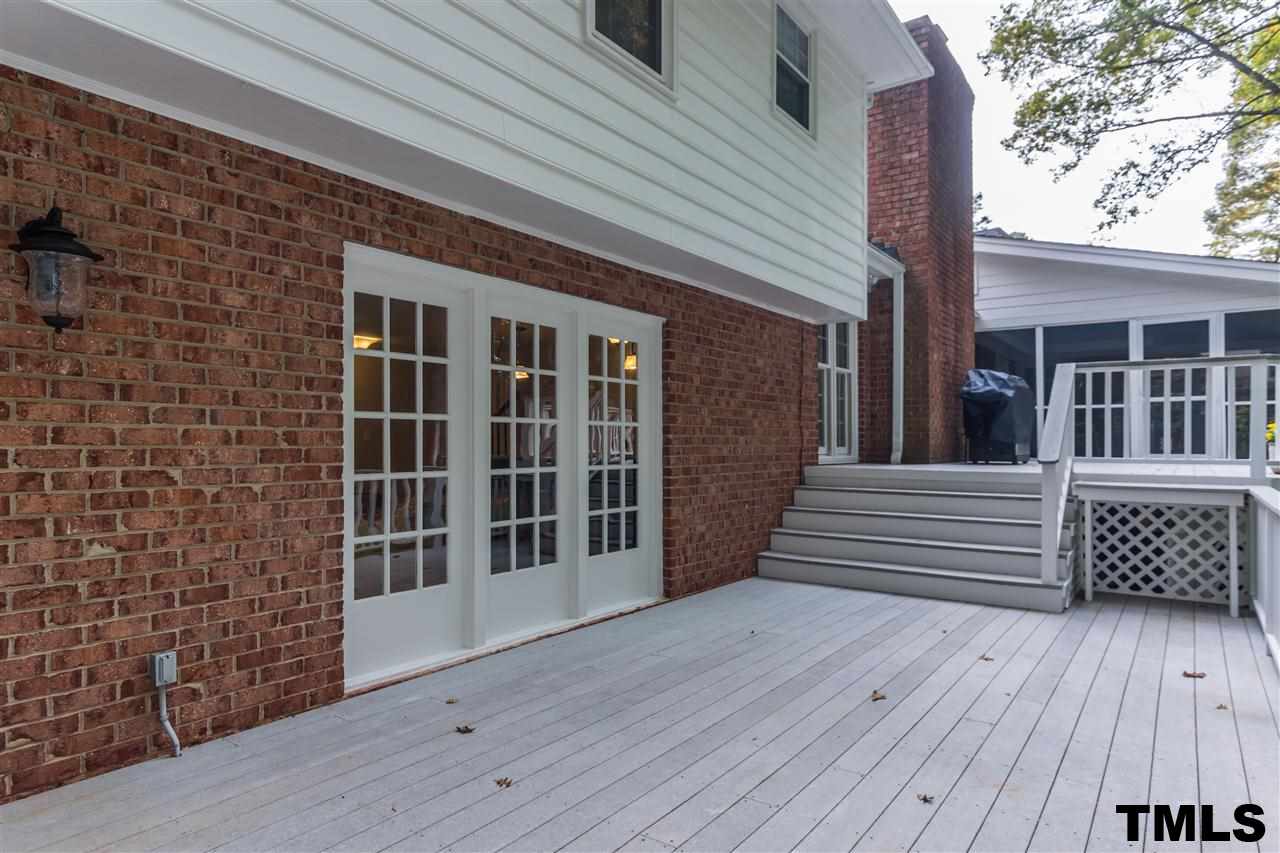 912 Queensferry Road Cary, NC 27511 - Photo 24 of 25 Lower level deck has access to Rec/Bonus room.