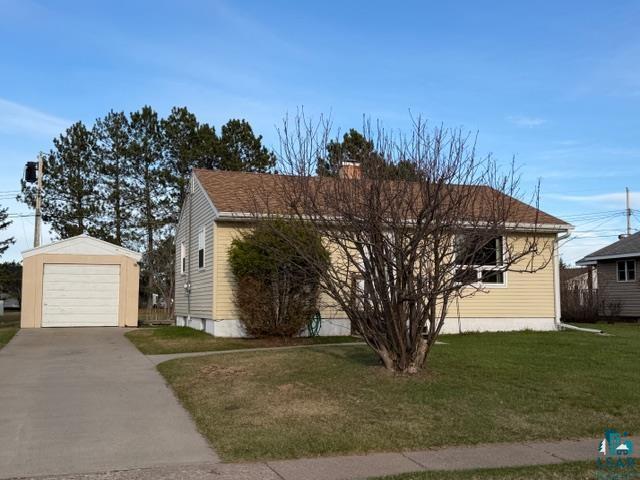 50 Beech Circle Babbitt, MN 55706 - Photo 23 of 24 Single-story residence featuring light yellow siding and a brown shingle roof