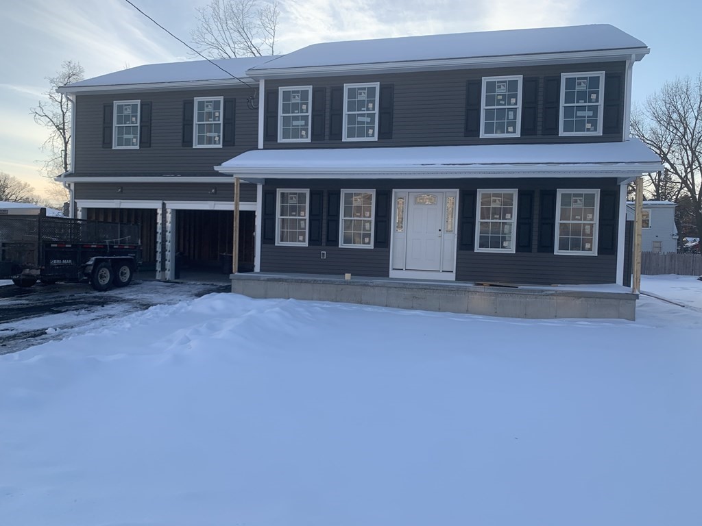 298 Gilbert Avenue Springfield, MA 01119 - Photo 1 of 1 a front view of a house with yard