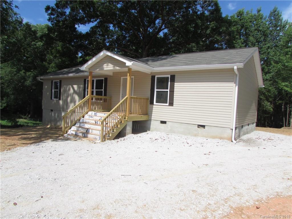 1562 Old Pinckney Road York, SC 29745 - Photo 1 of 9 a front view of a house with a yard