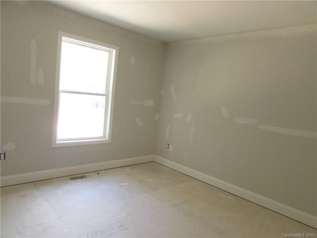 1562 Old Pinckney Road York, SC 29745 - Photo 2 of 9 an empty room with a window