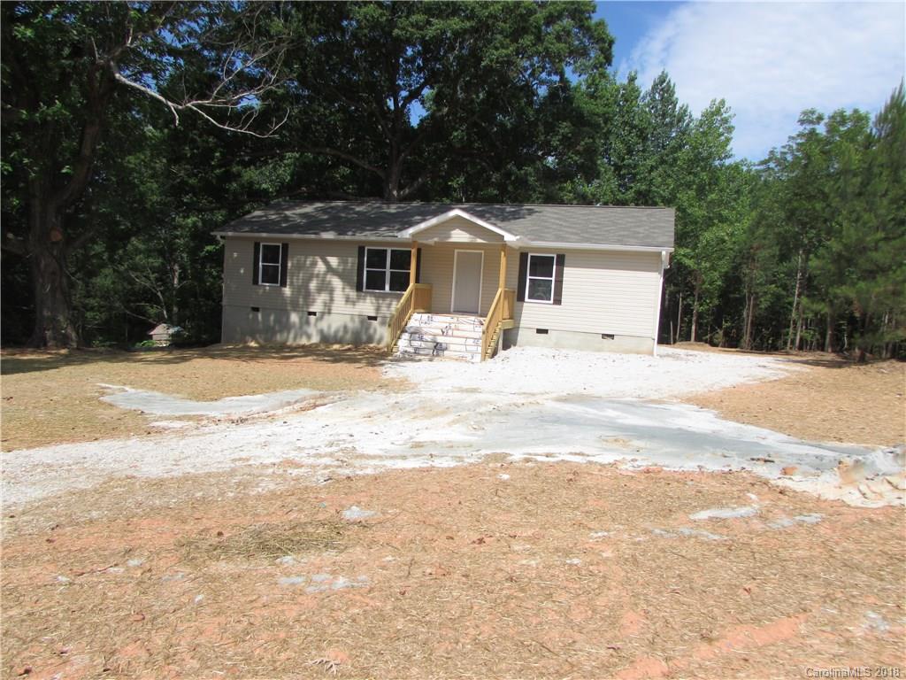 1562 Old Pinckney Road York, SC 29745 - Photo 3 of 9 a front view of a house with a yard