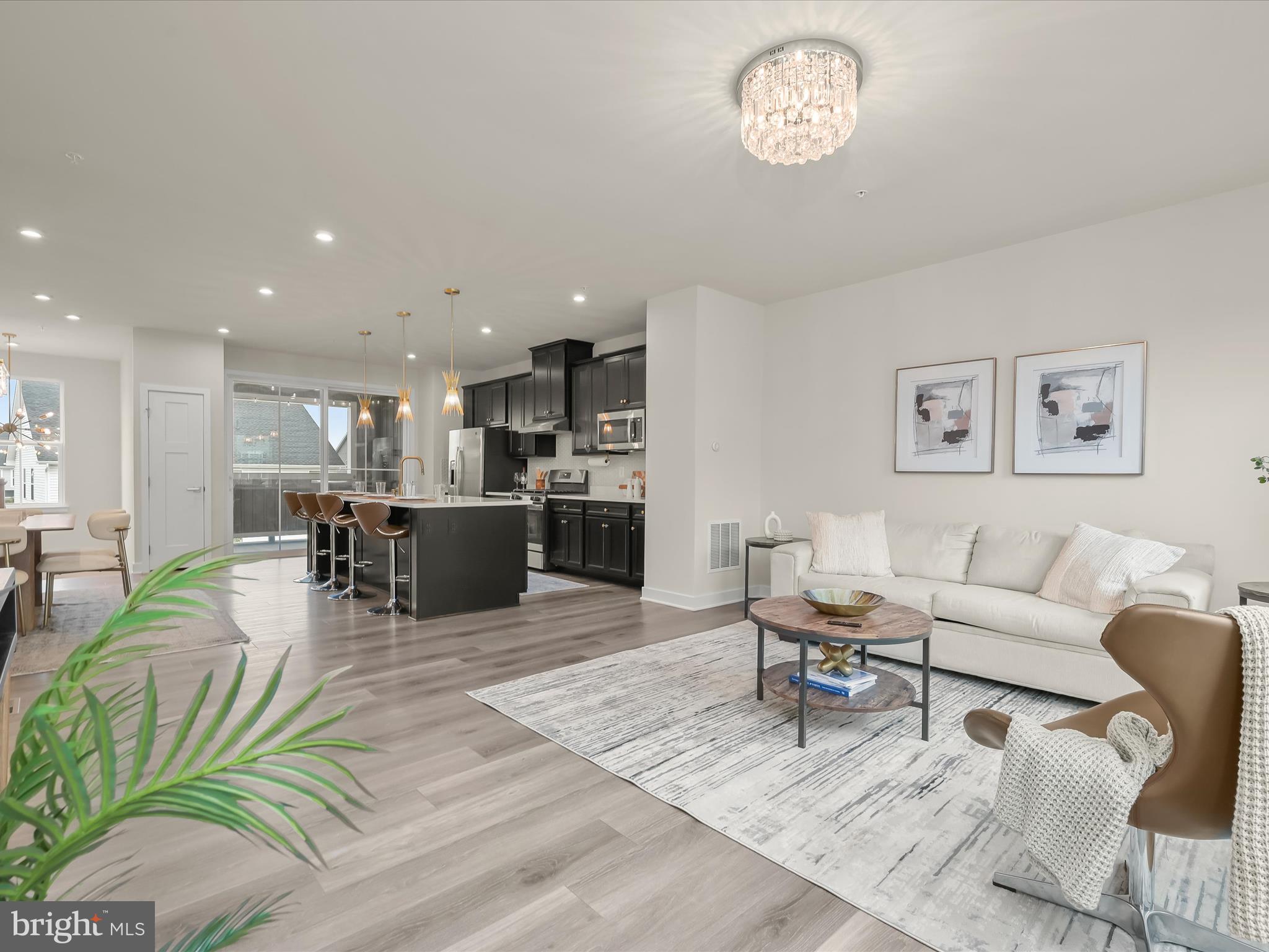 7330 Isabella Road Laurel, MD 20723 - Photo 14 of 47 a living room with furniture a table and chairs