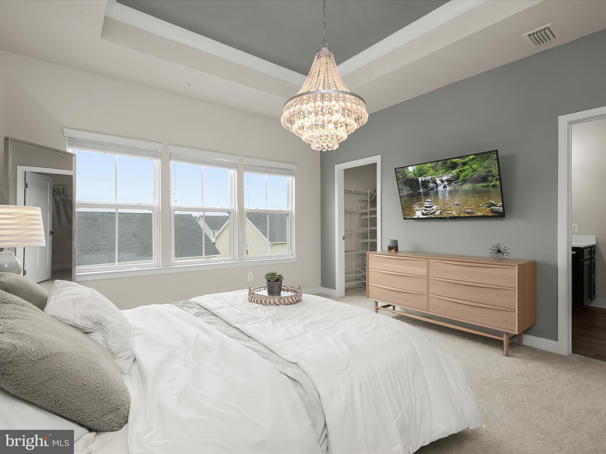 7330 Isabella Road Laurel, MD 20723 - Photo 19 of 47 a bedroom with a bed and a large window