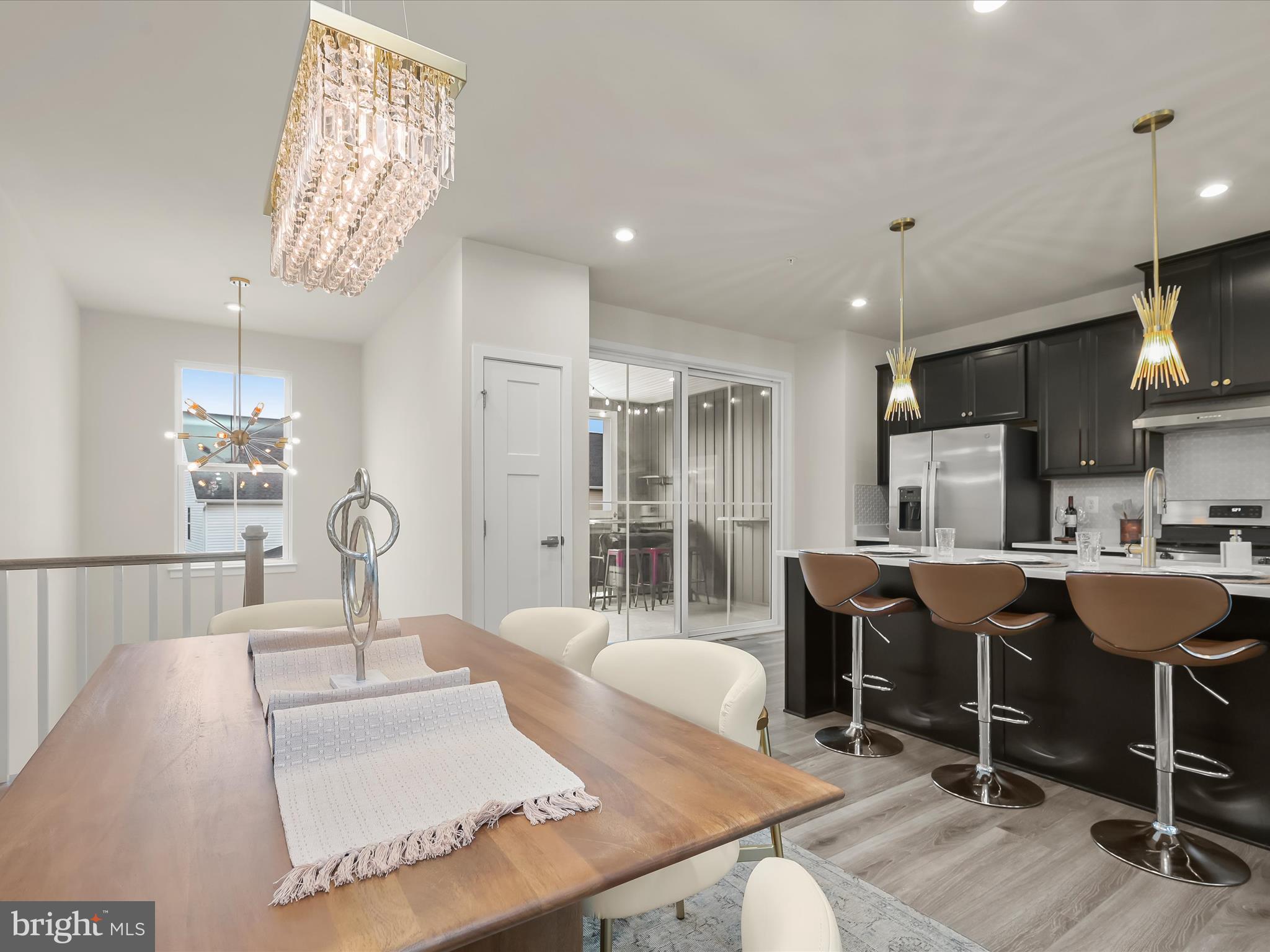 7330 Isabella Road Laurel, MD 20723 - Photo 3 of 47 a large kitchen with a table and chairs