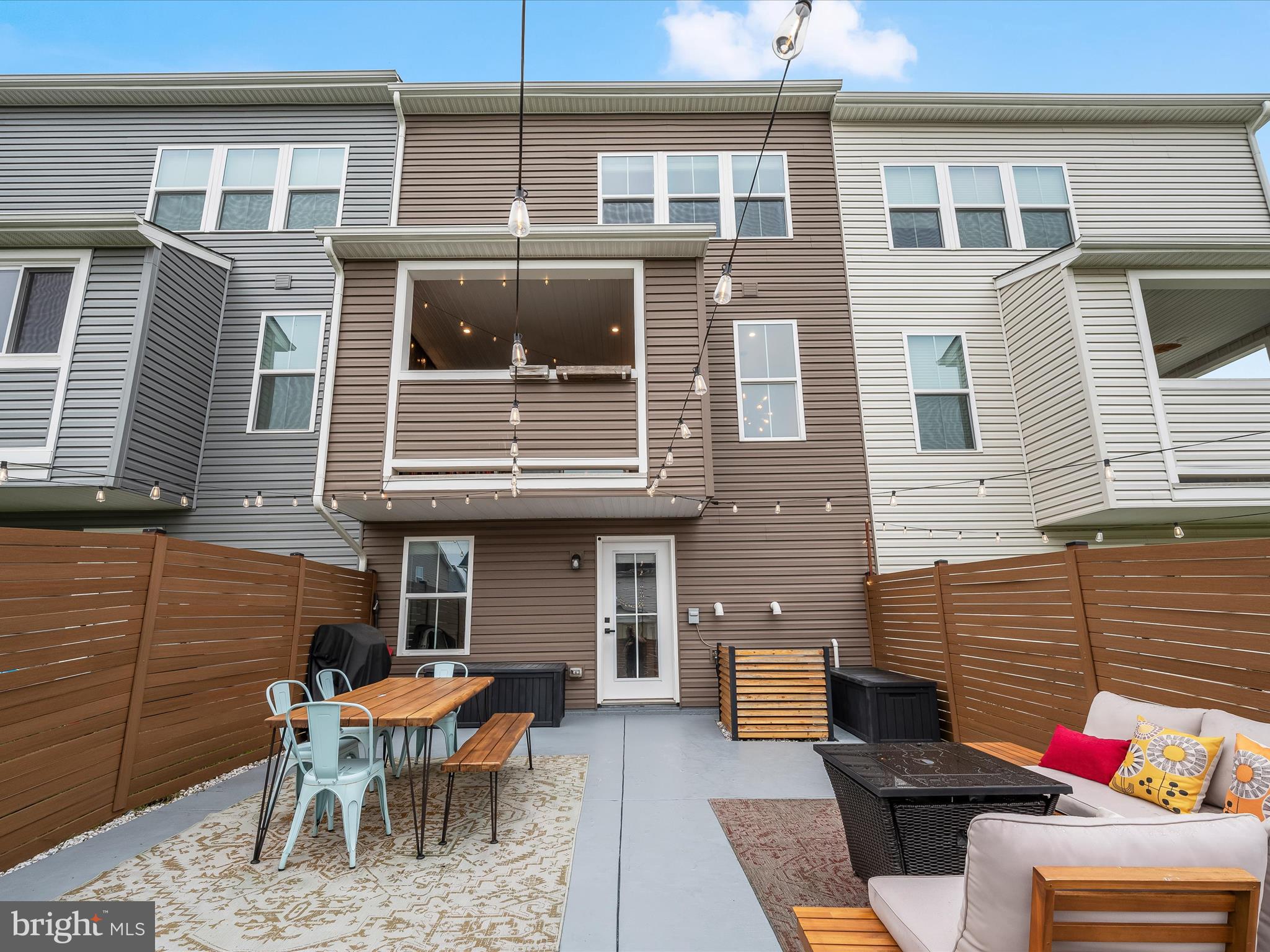 7330 Isabella Road Laurel, MD 20723 - Photo 39 of 47 a backyard of a house with outdoor seating