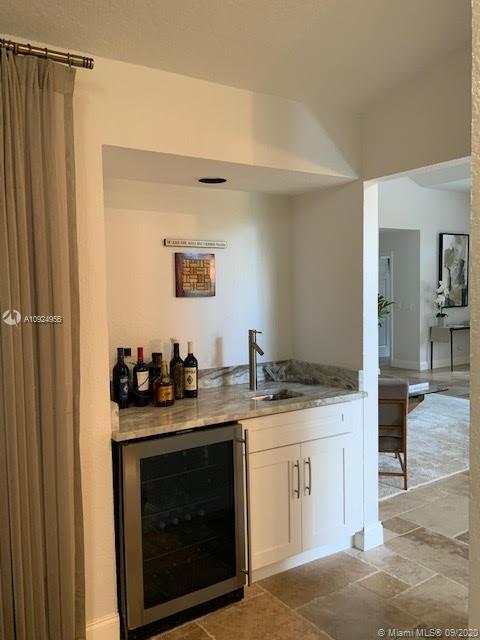 19715 Sedgefield Terrace Boca Raton, FL 33498 - Photo 12 of 43 Built in bar and cooler