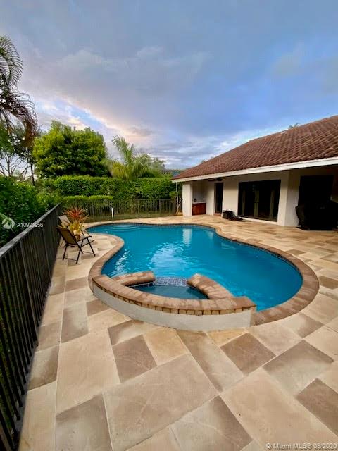 19715 Sedgefield Terrace Boca Raton, FL 33498 - Photo 29 of 43 Exterior patio and pool