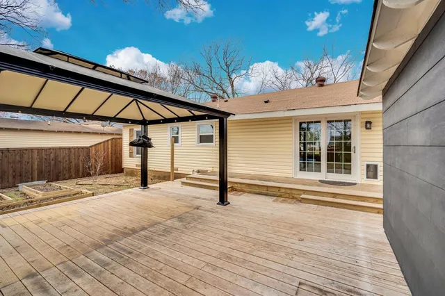 a view of a backyard of a house