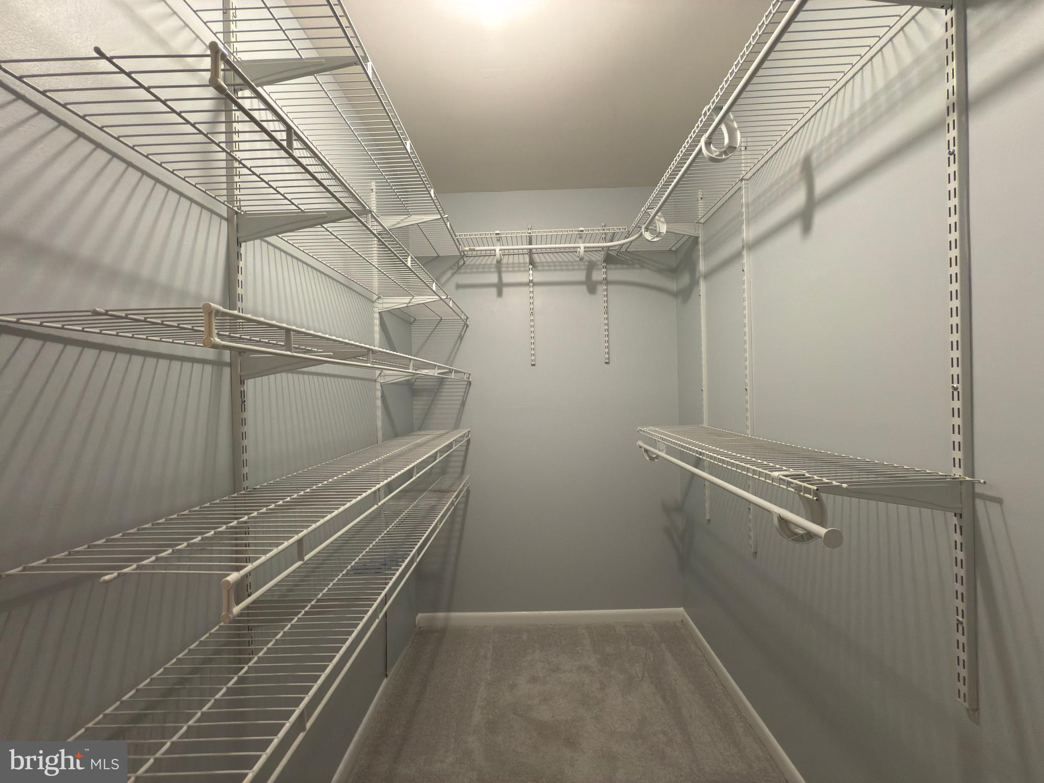 1415 Northgate Square, Unit 15/21B Reston, VA 20190 - Photo 16 of 28 a view of a room with racks on the wall