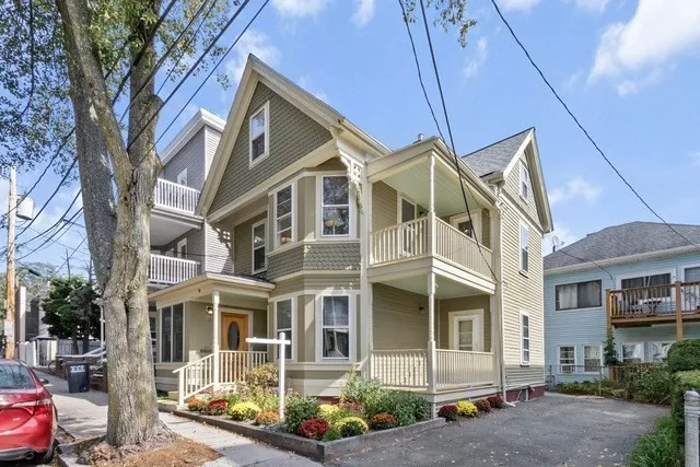 a front view of a building with street view