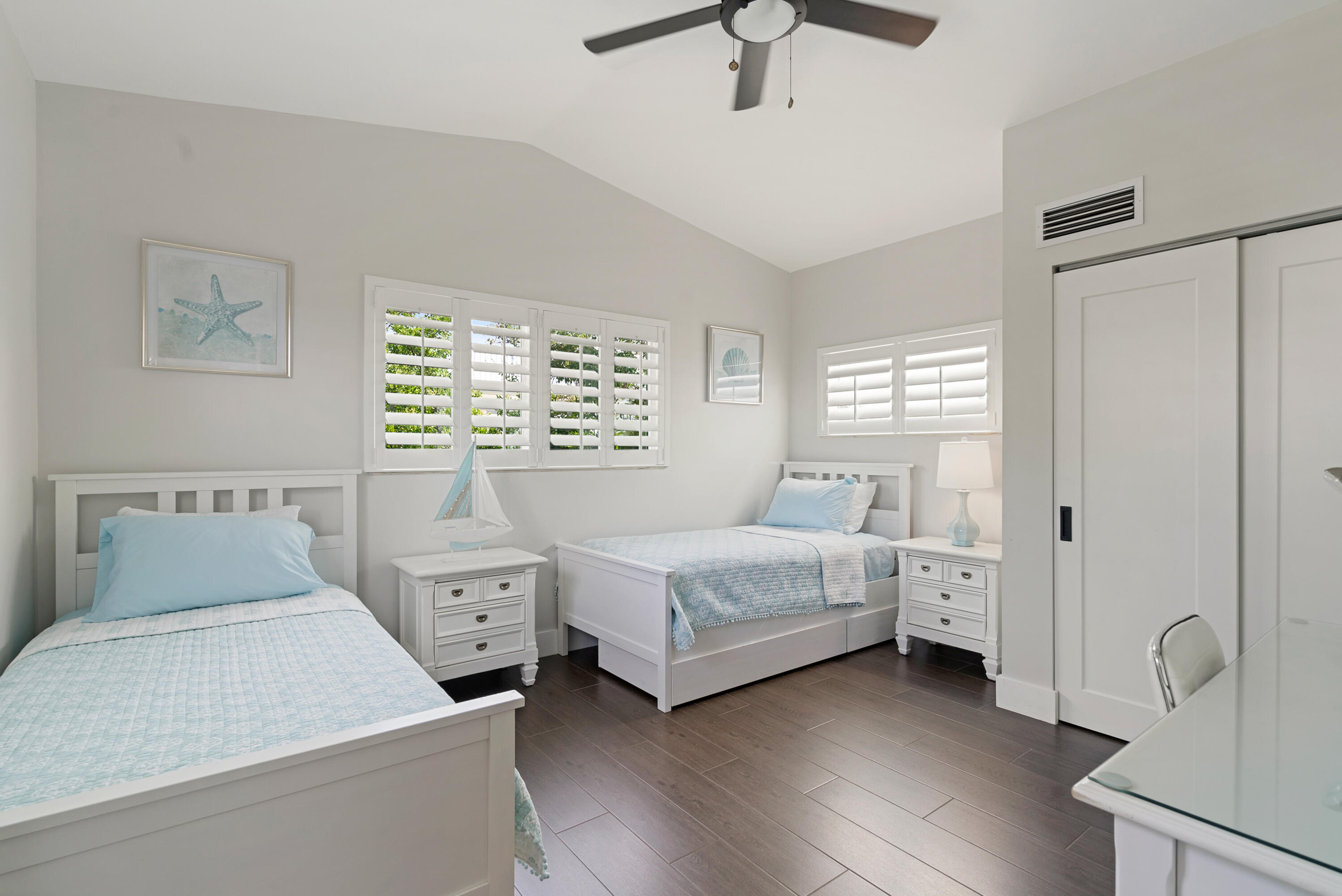215 Wildwood Circle Key Largo, FL 33037 - Photo 27 of 61 a bedroom with a bed and a window