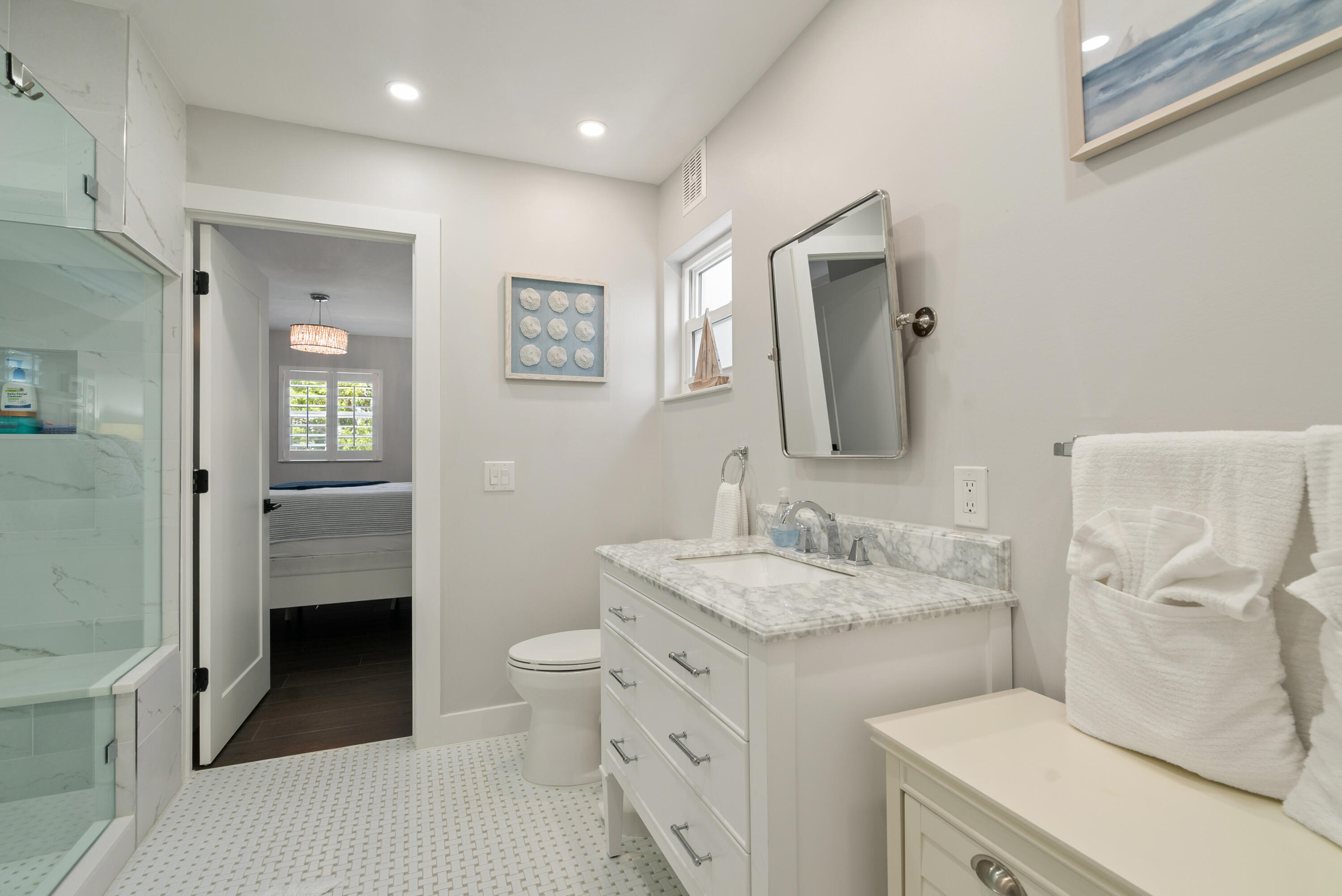 215 Wildwood Circle Key Largo, FL 33037 - Photo 29 of 61 a spacious bathroom with a granite countertop sink toilet and shower