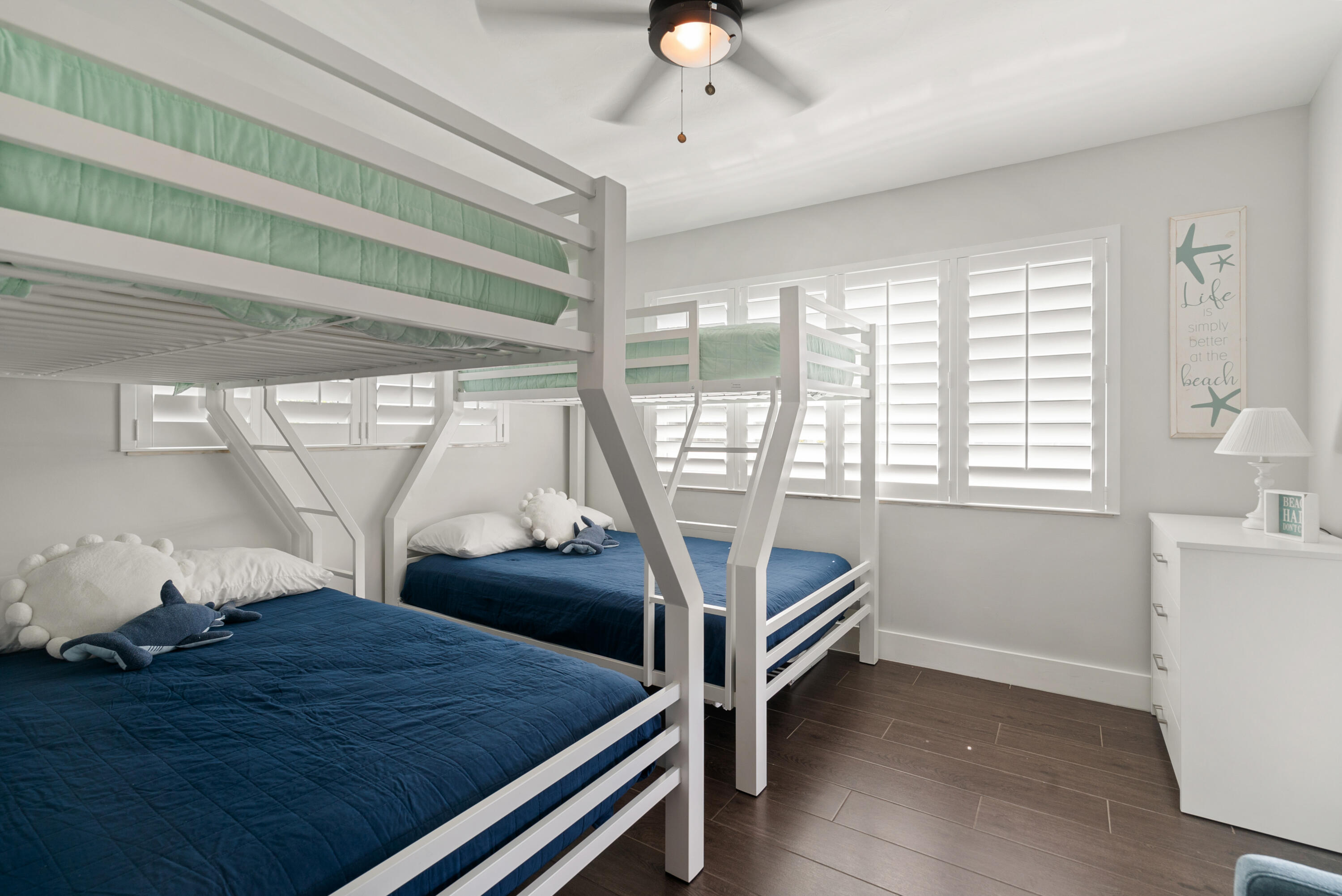 215 Wildwood Circle Key Largo, FL 33037 - Photo 31 of 61 a bedroom with a bed and a window