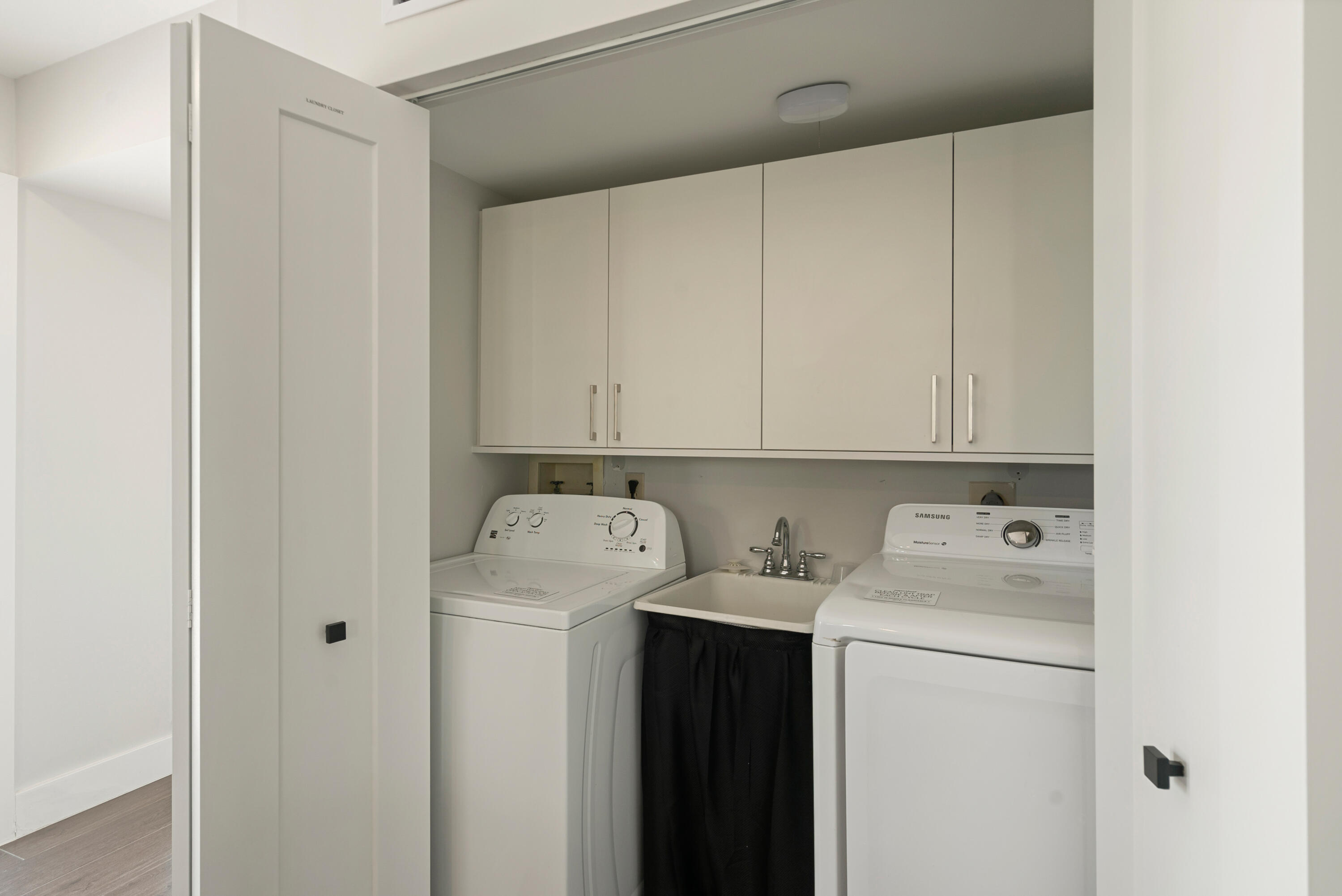 215 Wildwood Circle Key Largo, FL 33037 - Photo 35 of 61 a utility room with dryer and washer