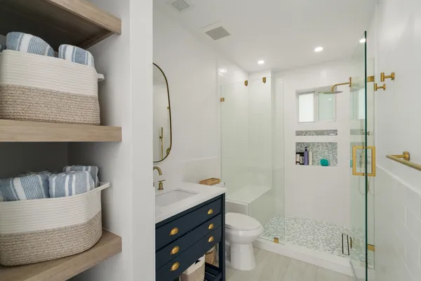 a view of a house with a yard porch and furniture