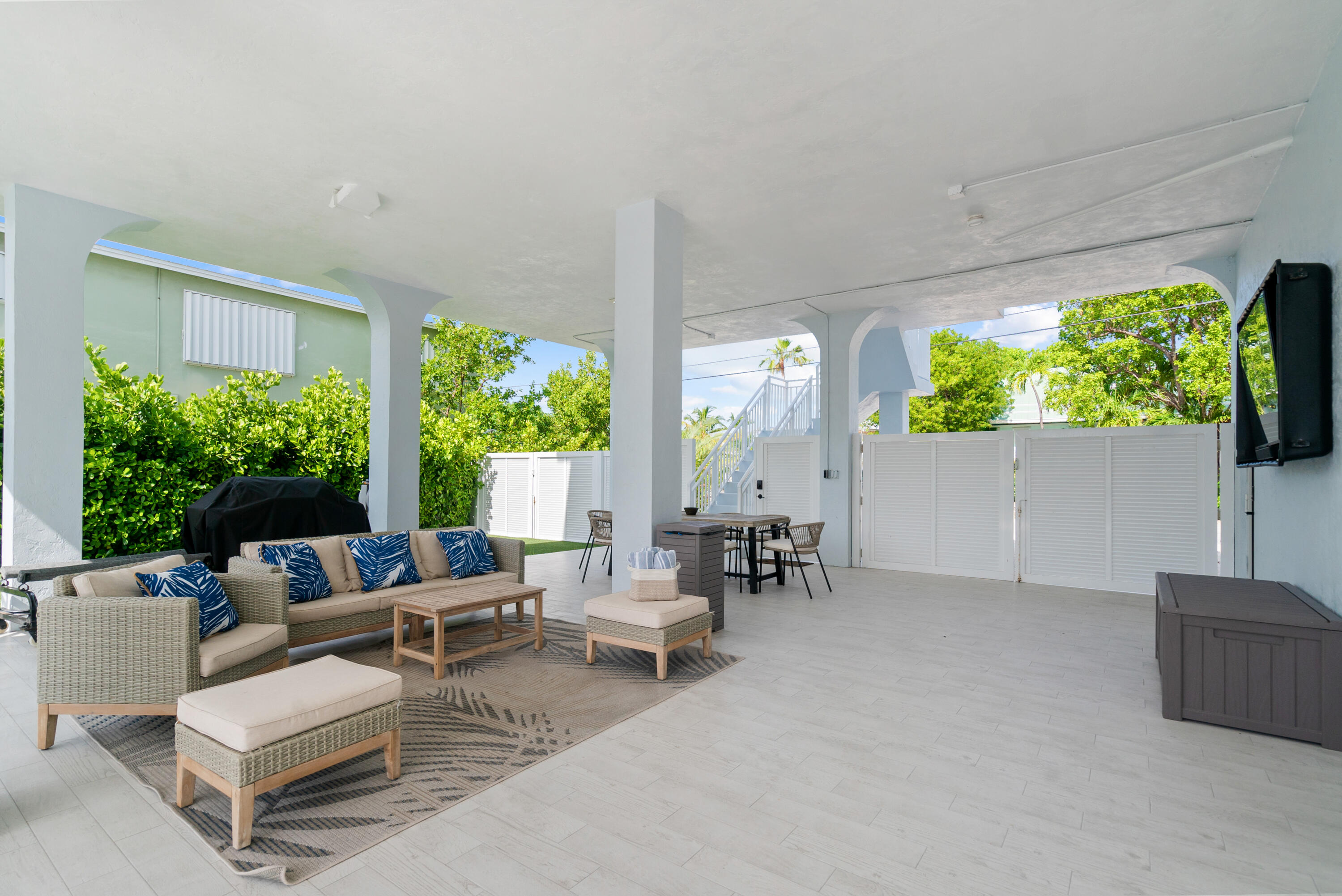 215 Wildwood Circle Key Largo, FL 33037 - Photo 5 of 61 a living room with furniture and a garden
