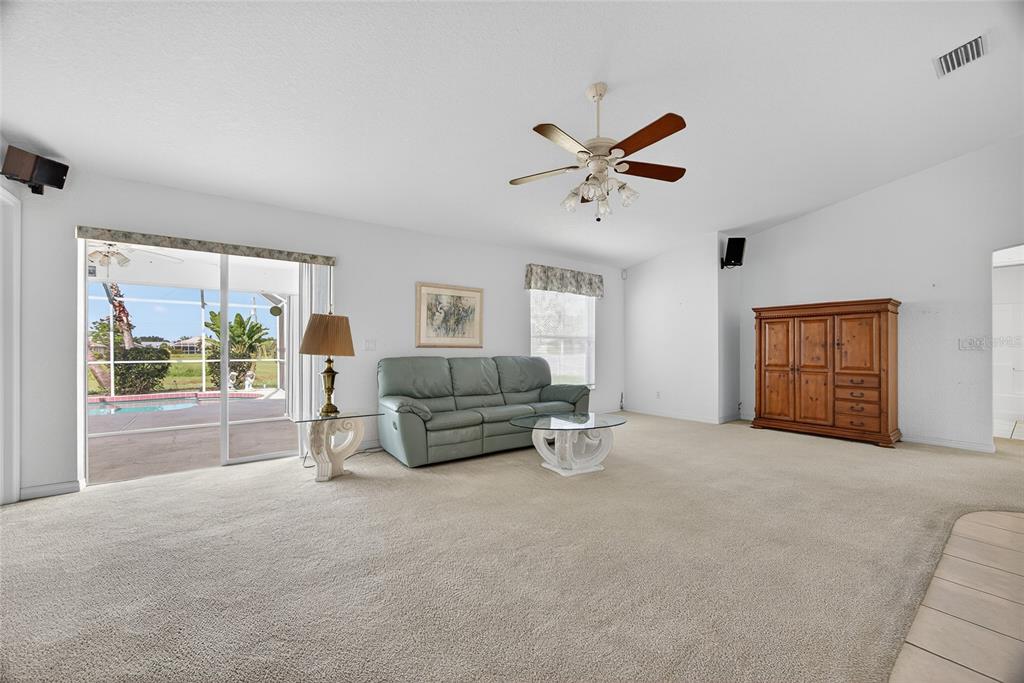 2405 Mauritania Road Punta Gorda, FL 33983 - Photo 13 of 31 a living room with furniture and a window