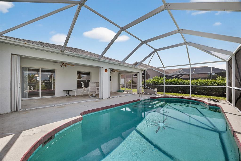 2405 Mauritania Road Punta Gorda, FL 33983 - Photo 22 of 31 a view of a house with backyard porch and sitting area