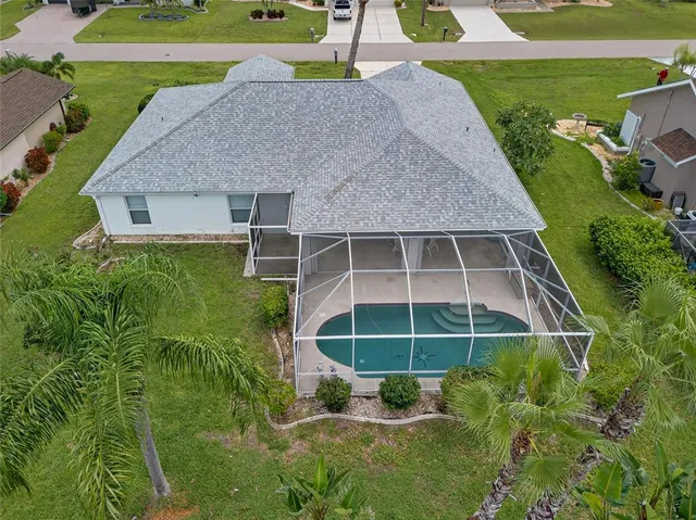 an aerial view of a house with a garden