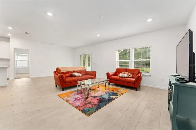 a living room with furniture and a couch
