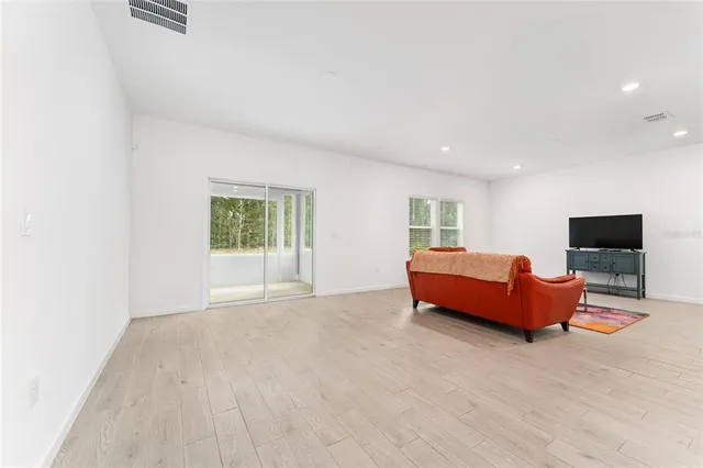 a spacious bathroom with a double vanity sink mirror and double