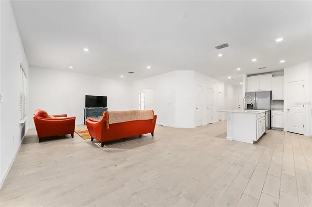 a bathroom with a sink double vanity and a mirror