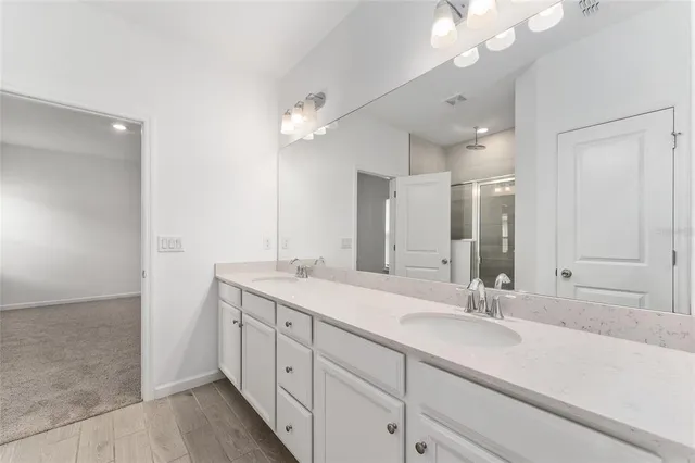 a view of empty room with a fireplace