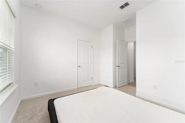 a view of a backyard with a garden