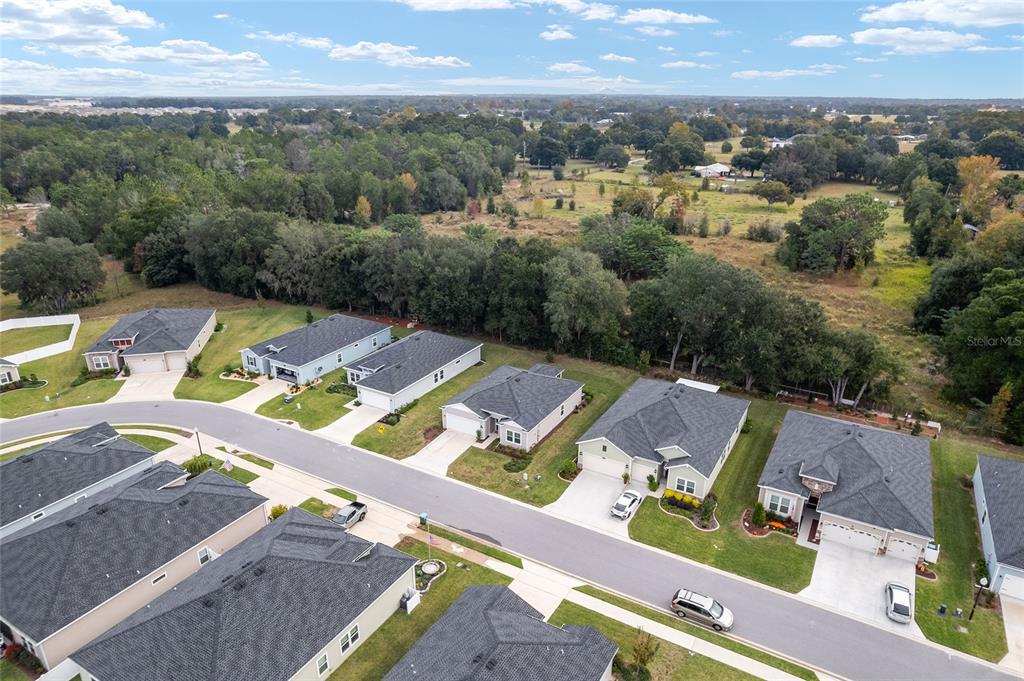 7755 Southwest 74th Loop Ocala, FL 34481 - Photo 56 of 66 an aerial view of a house with a garden