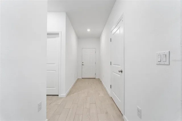 a kitchen with stainless steel appliances a refrigerator stove microwave and cabinets