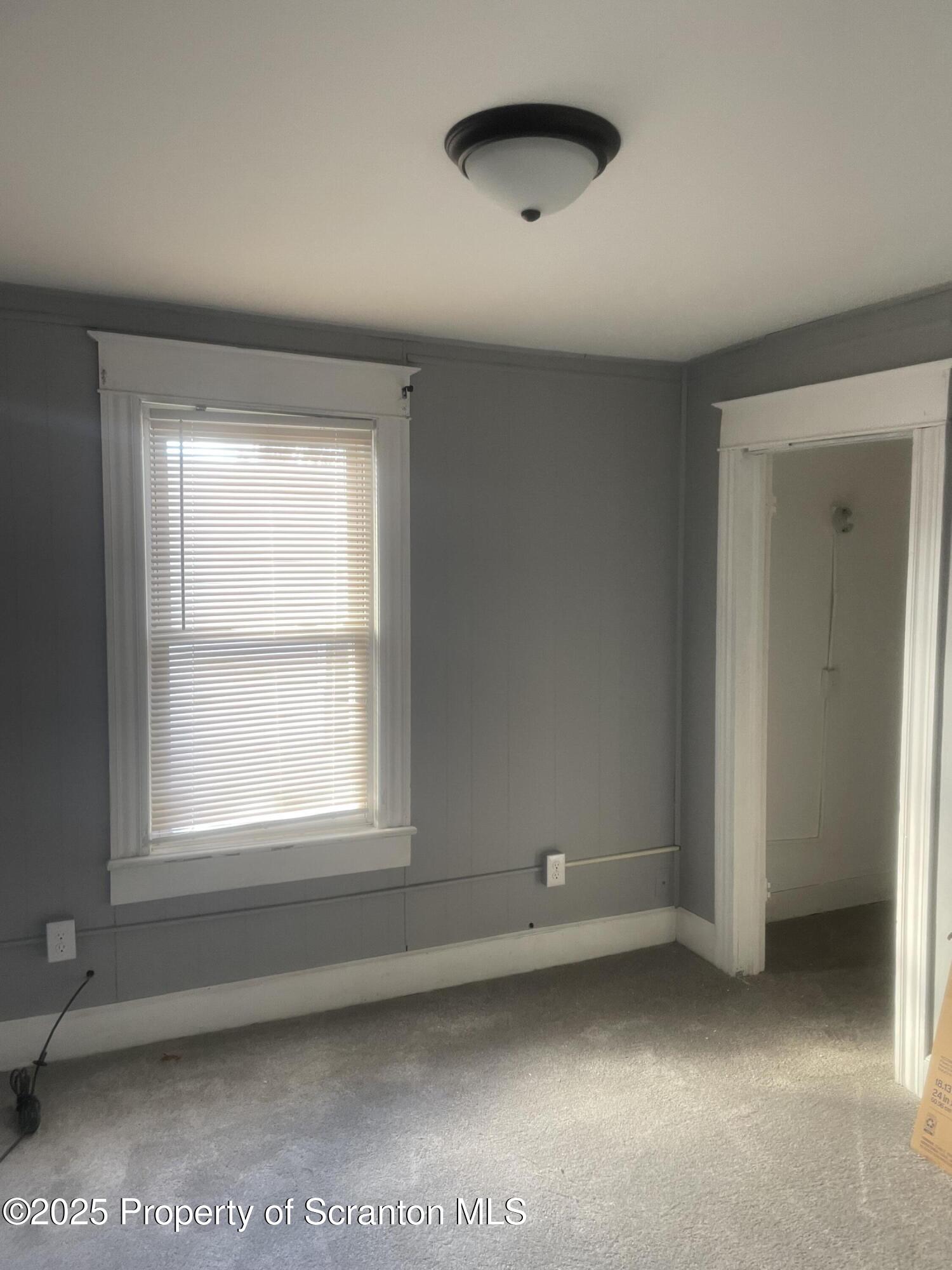 2301 Boulevard Avenue Scranton, PA 18509 - Photo 15 of 25 an empty room with a empty space and windows