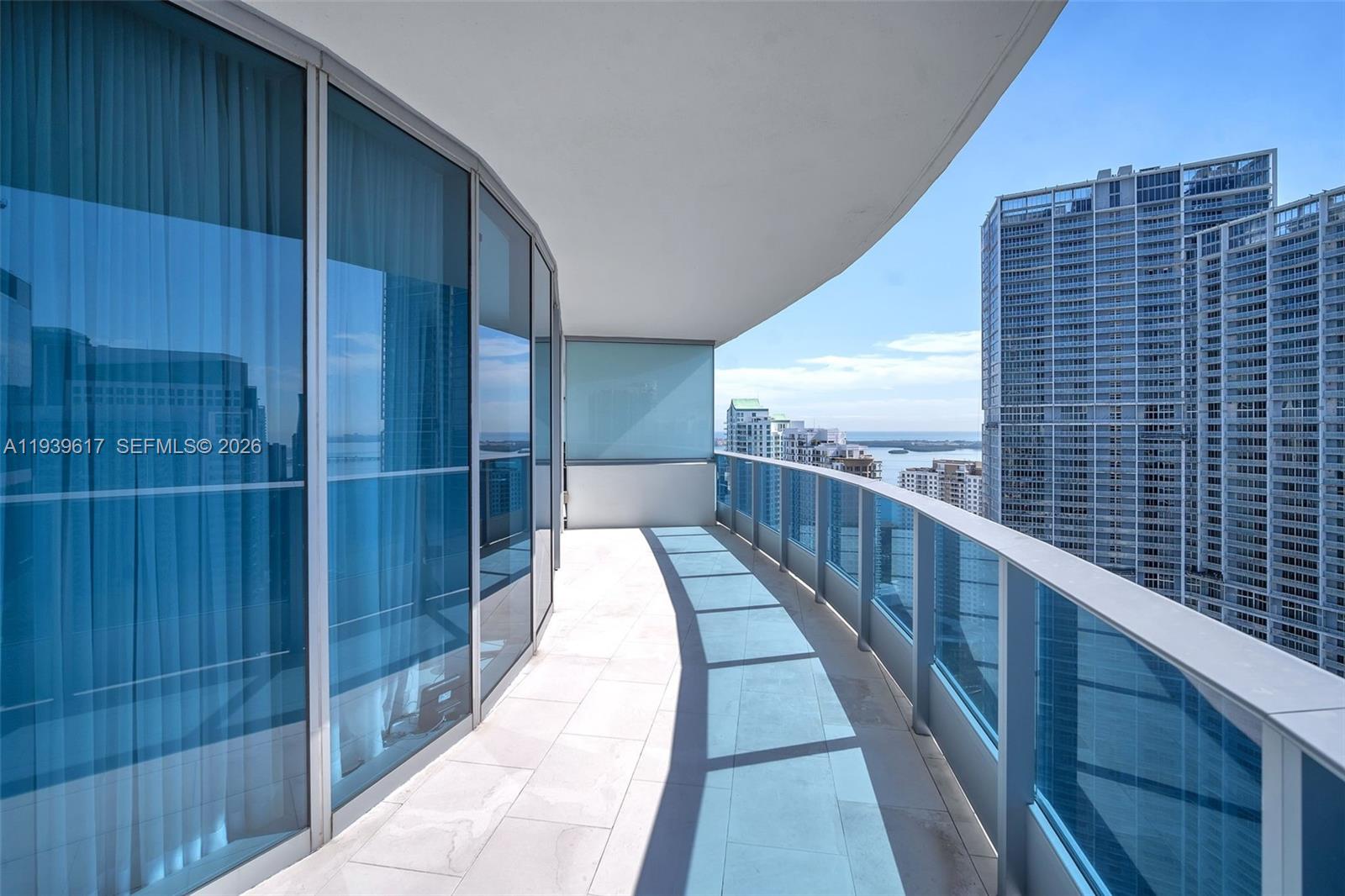 200 Biscayne Blvd Way, Unit 4202 Miami, FL 33131 - Photo 4 of 31 a view of balcony with wooden floor