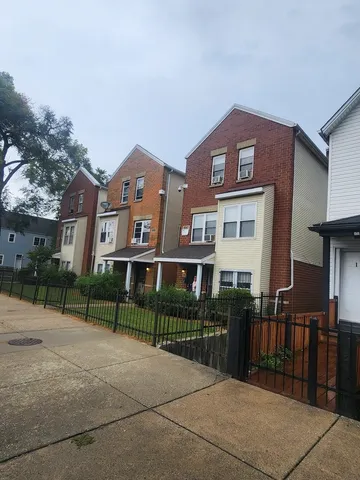 a front view of a building with street view